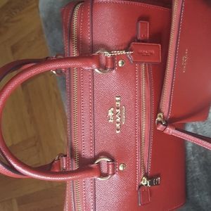 Red coach hand bag with crossbody strap and matching wallet